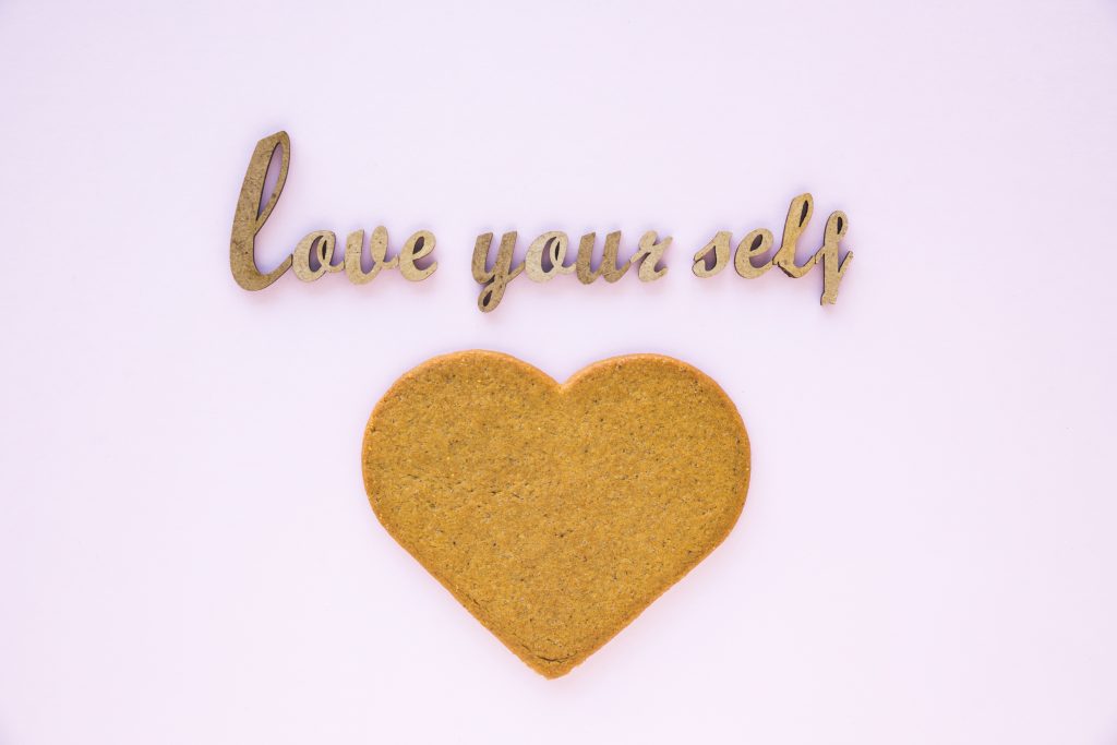 Text: Love yourself with a heart